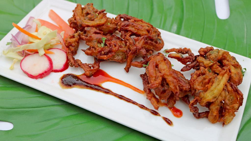 Onion Pakora · Delicious South Indian snack made with onions, gram flour, spices & herbs