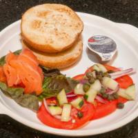 House Lox Salmon · toasted bagel, Persian cucumber, tomato, 
cream cheese, basil, onion, capers, and fresh Norw...
