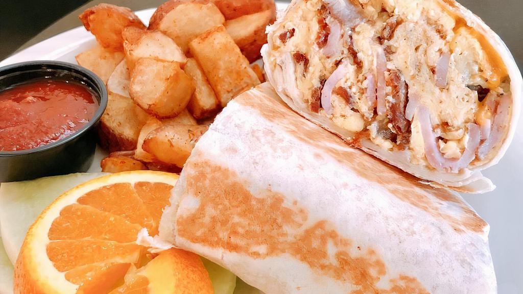 Breakfast Burrito · four eggs, country potatoes, cheddar cheese and a choice of ham, bacon, sausage, or chorizo
(Deep Fry Recommended)