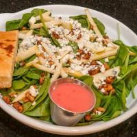 Baby Spinach Salad · organic baby spinach, sliced fuji apples, caramelized walnuts and blue cheese, served with a...