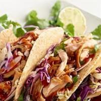 BBQ Tacos · 3  street style flour tortillas filled with your choice of BBQ and topped with slaw