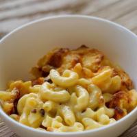 Mac & Cheese · Traditional baked macaroni and cheese.