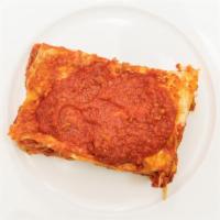 Lasagna · The Original Classic Lasagna with Béchamel and Bolognese Tomato Ragu’ sauce.