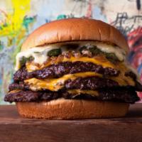 Smash Triple Cheeseburger · Three fine ground brisket, chuck, and short rib  smashed patties, american cheese and our di...