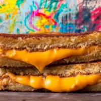 Grilled Cheese · Perfect grilled american cheese on a reverse Martin's famous potato roll