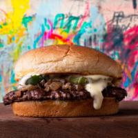 Smash Hamburger · fine ground brisket, chuck,  and short rib smashed patty and our dirty sauce on a Martin's f...