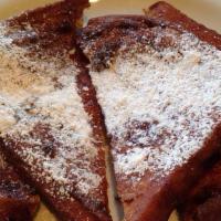 French Toast · 4 pieces of Texas toast, topped with powdered sugar. Butter and syrup on the side.