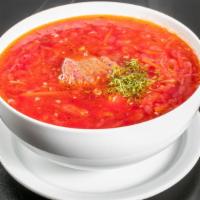 Borscht  · Soup with beef chunks, potatoes, cabbage and beets. Served with sour cream.