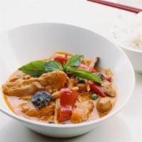 Spicy Basil Chicken · Tender Braised Chicken, Peas & Carrots, Fresh Chili, Shiitake, Bamboo Shoots, Thai Basil.. *...