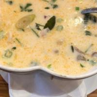 Tom Kha Chicken · Coconut milk soup with mushroom, lemongrass, and lime leaf.