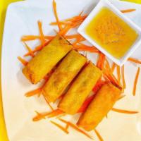 Crispy Veggie Roll · Deep-fried mixed vegetables, wrapped with egg rolls. Served with pineapple sauce.