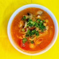 Tom Yum (Hot and sour soup) · Thai style hot and sour soup with mushrooms, tomatoes, galangals, lemongrass, kaffir lime le...
