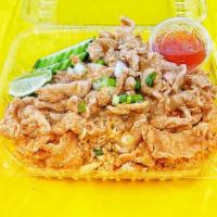 Crispy  Chicken Over Fried Rice · Fried chicken over Thai fried rice with shrimp, egg, white onion, peas, carrots, tomato, gre...