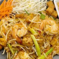 Pad Thai · Stir-fried small rice noodles with egg, bean sprouts, green onions.