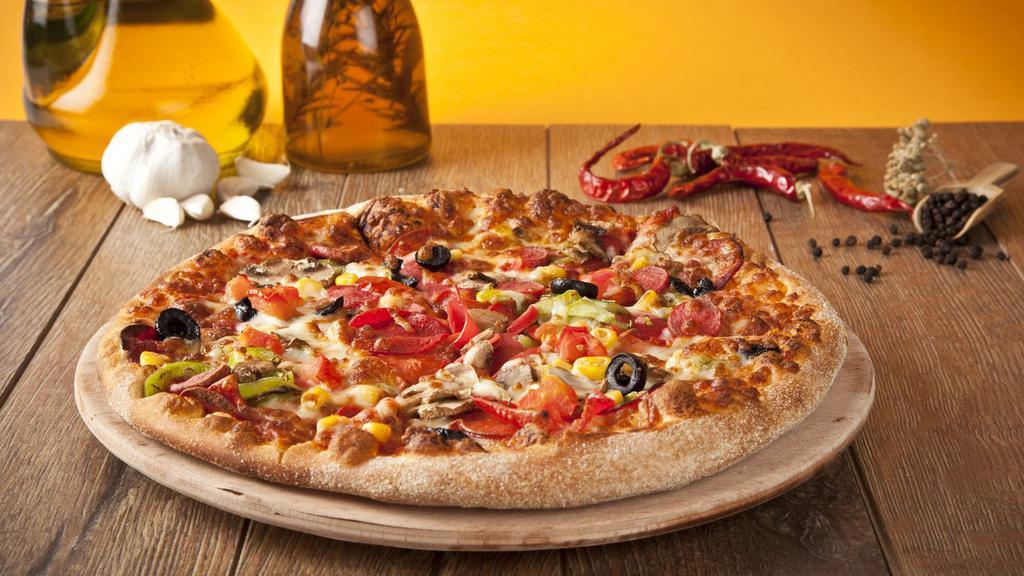 Gruyere Cheese & Mushroom Pizza · Delicious pizza with gruyere cheese, mushrooms, roasted red onions, thyme, and cream sauce.