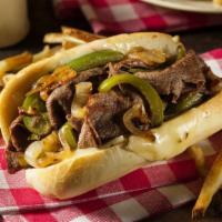 Philly Cheesesteak · Thinly sliced juicy steak with onion, mushrooms, green pepper & melted cheese.