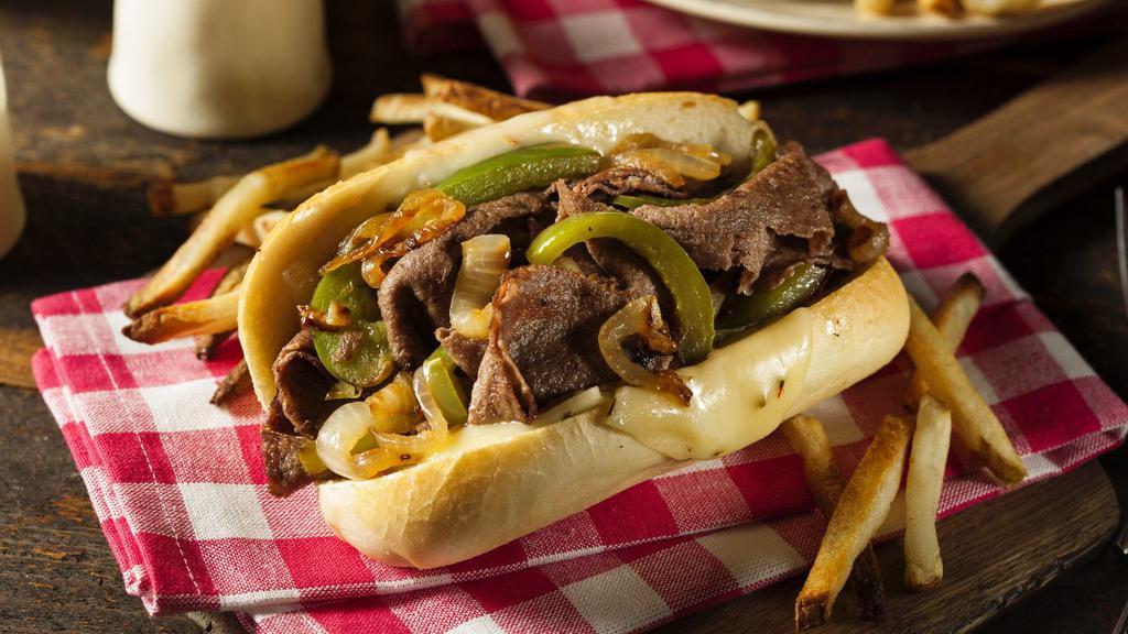 Philly Cheesesteak · Thinly sliced juicy steak with onion, mushrooms, green pepper & melted cheese.