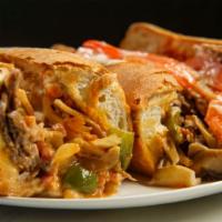 Buffalo Philly Cheesesteak · Philly cheesesteak with juicy, chopped steak, your choice of melty cheese, grilled onions, a...