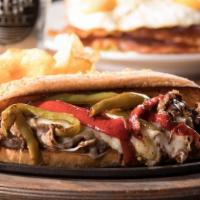 Bacon Philly Cheesesteak · Philly cheesesteak with juicy, chopped steak, your choice of melty cheese, grilled onions, a...