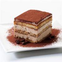 Tiramisu · Delicate coffee dipped lady fingers, layered with a creamy mascarpone filling and a hint of ...