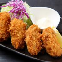 Fried Oyster · Hand breaded and fried oysters, served with fries and tartar sauce.
