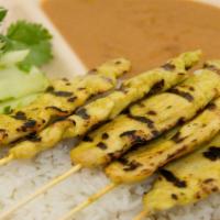 Sa-Tay Chicken · Grilled chicken breast marinated in Thai spices, served with peanut sauce and cucumber salad...