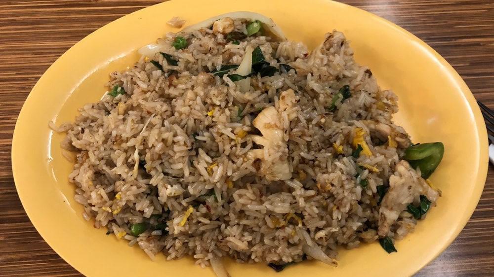 Basil Fried Rice Chicken · with egg, onion, bell pepper, peas, carrots, basil and Thai chili.
