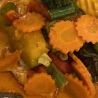 Pumpkin Curry Chicken · Pumpkin, tomatoes, bell pepper, and basil simmered in red curry paste and coconut milk. Incl...