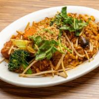 Veggie Pad Thai · (Please indicate with or without egg.)
Wok-fried Thai vermicelli rice noodles with tofu, bro...