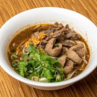 Thai Boat Noodle Soup · Thai herbal beef broth with Thai vermicelli rice noodles, sliced beef, beef balls, bean spro...