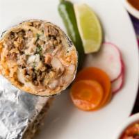 Super Burrito · Flour tortilla, choice of meat, rice, beans, freshly diced onions and cilantro, cheese, sour...