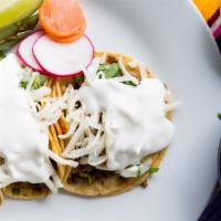 Three Super Street Tacos · Gluten free. Locally made corn tortillas with your choice of meat, diced onions, cilantro, c...