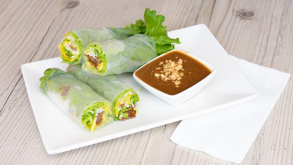 Pork and Mango Spring Rolls | Gỏi Cuốn Xoài Thịt · -2- Fried egg rolls, rice paper, lettuce, and side of house fish sauce or peanut sauce.