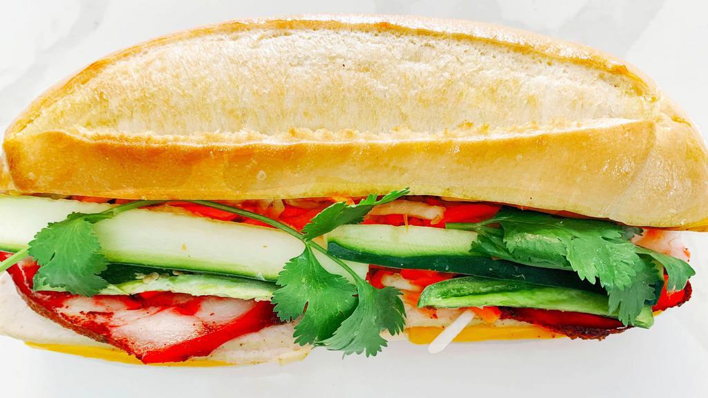Bánh Mì The Cheesy Classic · Vietnamese homemade pork & chicken ham with melted American cheese.