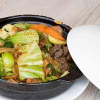 Clay Pot Rice| Cơm Tây Cầm · Chicken, beef, prawns, zucchini, bok-choy, broccoli, carrots and onions are deliciously cook...