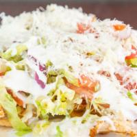 Tito's Chicken Tacos · Organic homemade tortillas, organic marinated chicken, red onion, tomatoes, parmesan cheese,...