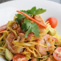 #13A Avocado Salad · Chunks of avocado tossed with shredded green mango, shallots, prawns and topped with toasted...
