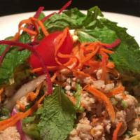 #11 Chicken (larb) Salad · Minced chicken with onions, mint leaves, roasted chili, rice powder and lemon juice dressing.