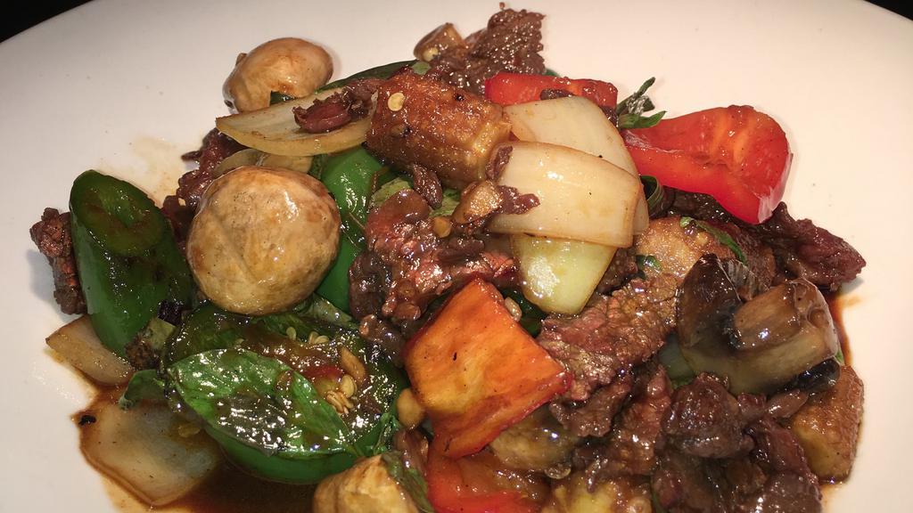 #18 Basil Beef · Sliced beef flank wok-tossed with chili, garlic, mushroom, onion and basil.