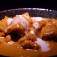 #45 Chicken Mussamun Curry · Chunk of chicken with potatoes and peanuts simmered in Thai mussamun curry and coconut milk.