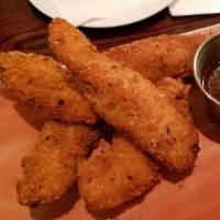 Chicken Tenders · 12 all-white meat chicken tenders with your choice of dipping sauce. For a complete meal, co...