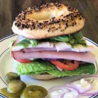Turkey & Ham Sandwich · Mayonnaise, mustard, lettuce, tomato, onion, spinach, and swiss cheese. With Bagel, Bread, B...