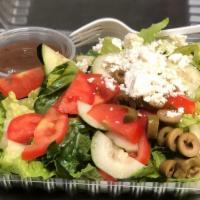 Greek Salad · Lettuce, tomatoes, cucumber, olives, and feta vinaigrette dressing.