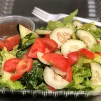 Mixed Green Salad · Lettuce, tomatoes, and cucumber.