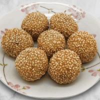 Y49. Sesame Ball芝麻球 · Deep Fried Sesame Ball Filled with Red Bean Paste.