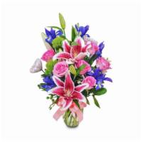 Lilies, Iris, and Roses · Bouquet or vase arrangement with: 2 Stems of Stargazer Lilies, 5 Stems of Purple Iris, 5 Ste...