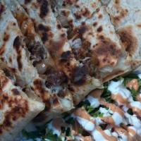 Super Quesadilla · Meat of choice: (Beef, carnitas, pastor,  chicken) chesse, grilled onion, and on the side le...