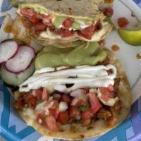 Super Tacos · Choice of meat:  With 2 corn tortilla with melted cheese, pico de gallo, sour cream, avocado...
