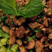 Fattoush Salad · Hearts of romaine, crispy pita, mint, scallions, tomatoes, cucumbers, radishes, olive oil, l...