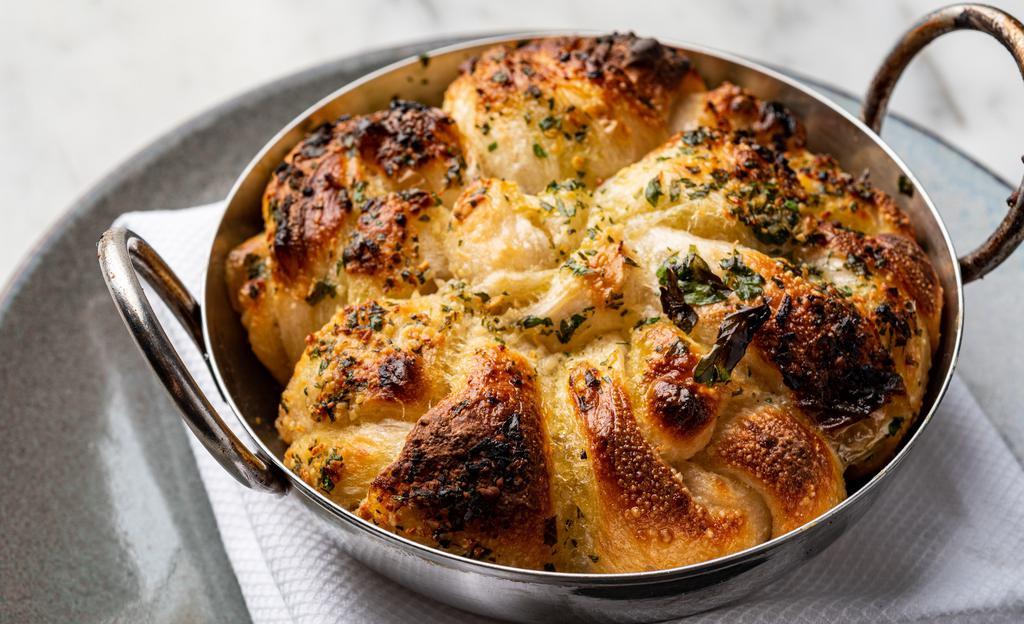 Garlic Knots NF SF · Soy-free. Nut-free. Classic, old school Italian herb garlic knots baked in the pizza oven